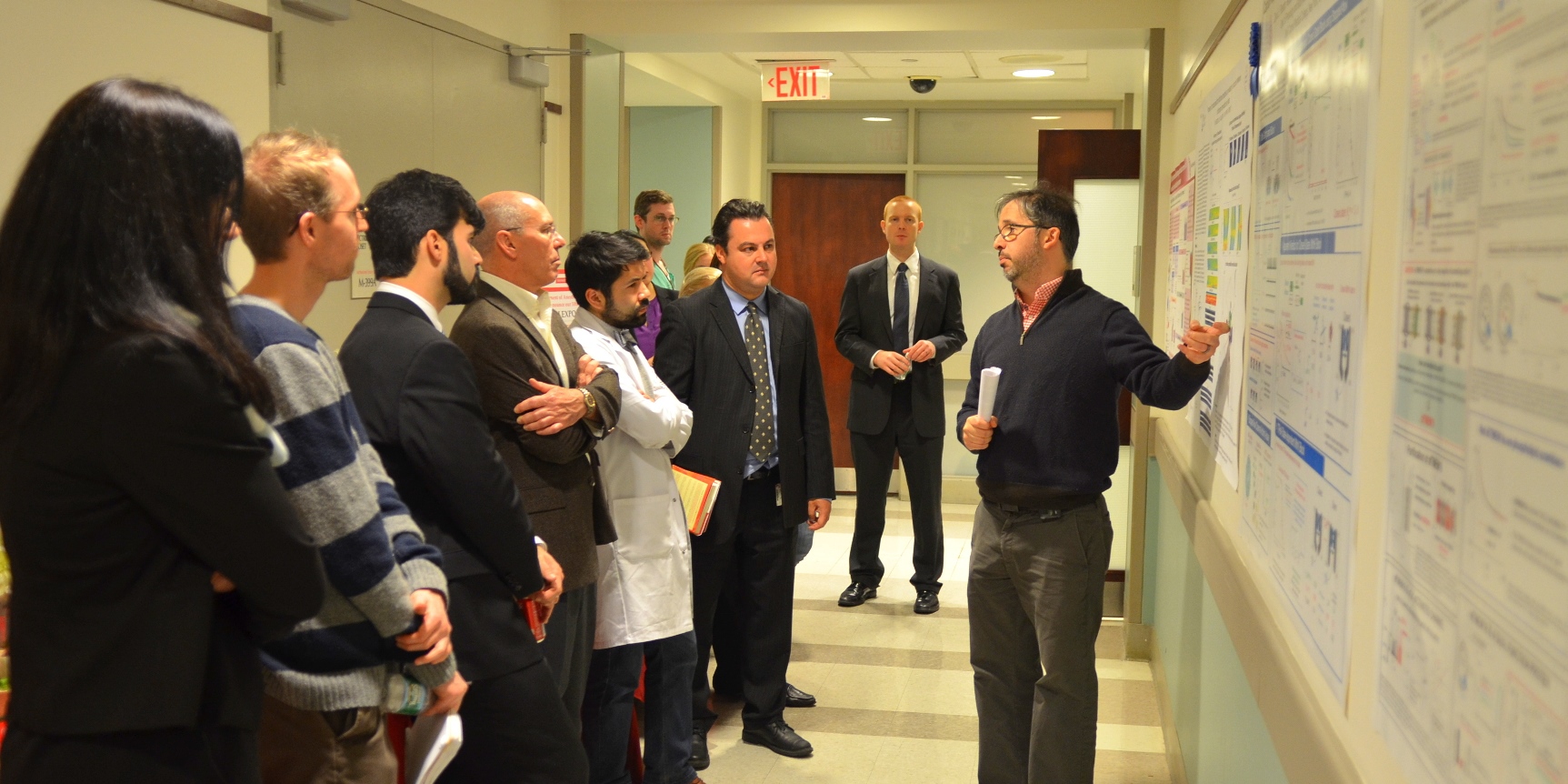 Dr. Alex Proekt presents a poster at the Research Exposition.