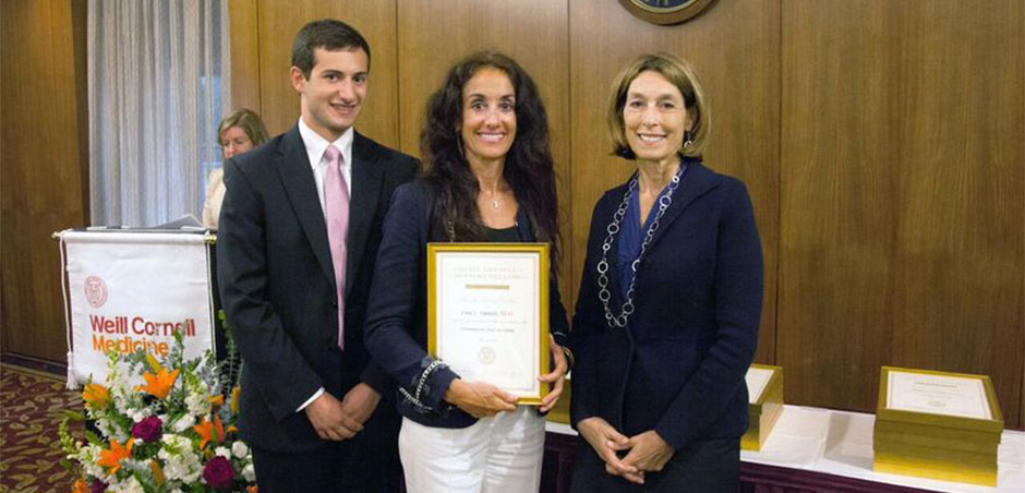 Dr. Dana Gurvitch, center, with Dean Laurie Glimcher, right, at the Celebration of Teaching dinner. Photo: Ira Fox.