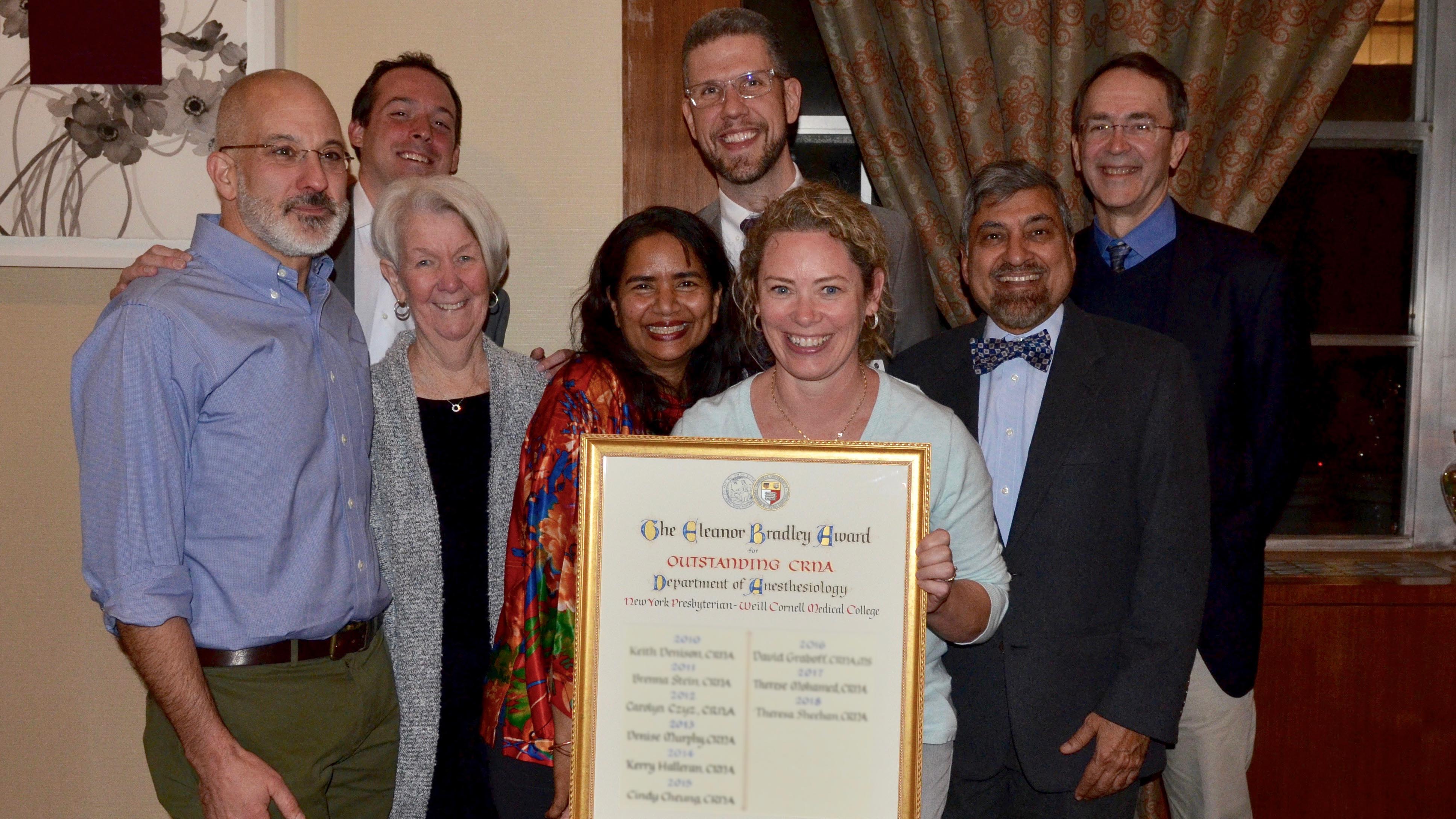 CRNA Theresa Sheehan, center, received the Eleanor Bradley Award.