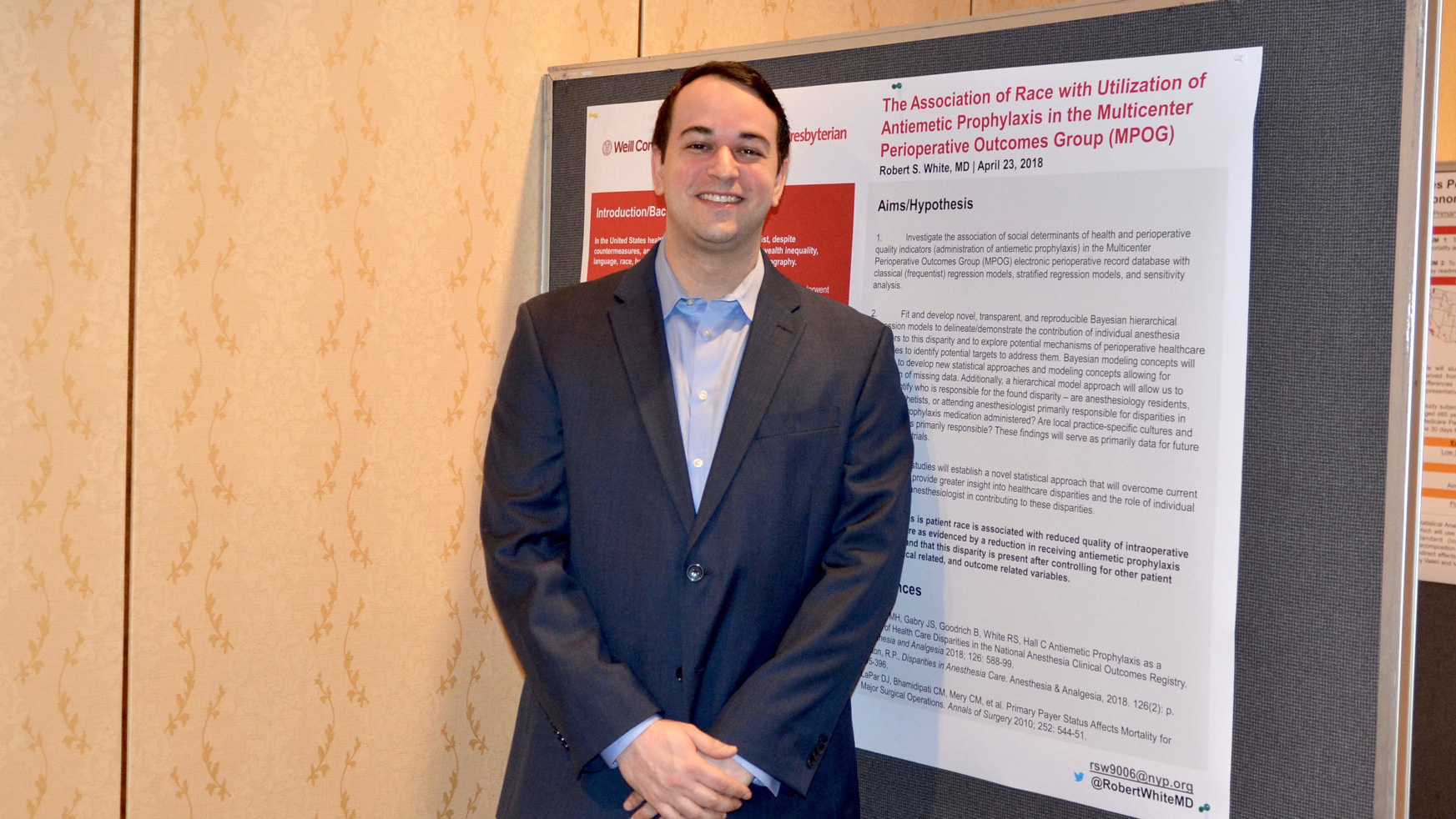 Dr. Robert White presenting winning research.