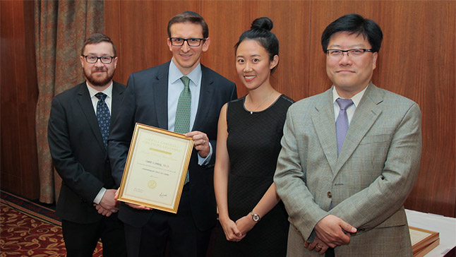 Dr. Roniel Weinberg, second from left, and Dr. Augustine M.K. Choi, dean of Weill Cornell Medicine, at right. Photo: Ira Fox. Dr. Roniel Weinberg, second from left.